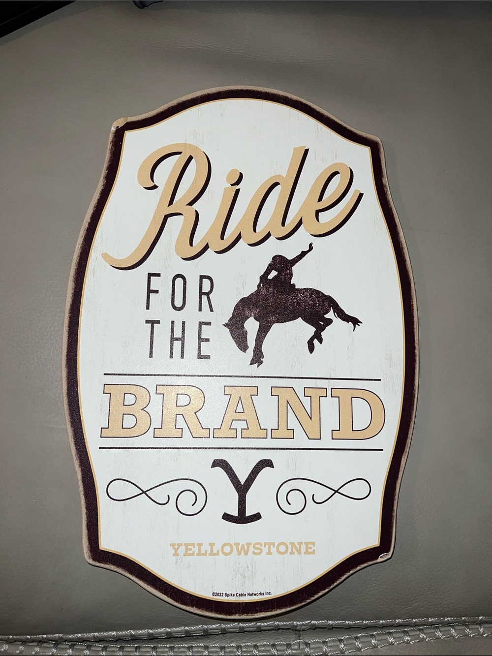 Yellowstone 'Ride for the Brand' Wall Sign in White and Tan